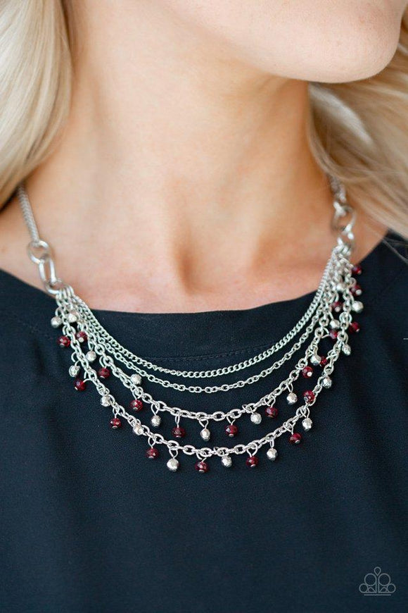 Paparazzi Financially Fabulous - Red Dainty silver and red crystal-like beads cascade from two shimmery silver chains. Infused with plain silver chains, the colorful strands layer below the collar for a flirtatious look. Features an adjustable clasp closure.

