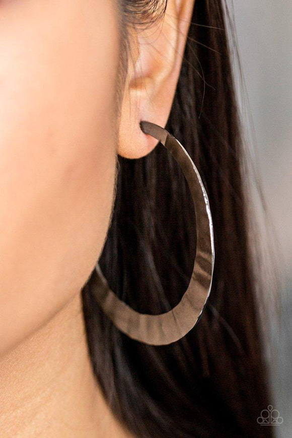 Paparazzi Slayers Gonna Slay - Black Brushed in a high-sheen finish, a delicately hammered gunmetal hoop curls around the ear for a fierce look. Earring attaches to a standard post fitting. Hoop measures 2 1/2