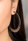 Paparazzi Slayers Gonna Slay - Black Brushed in a high-sheen finish, a delicately hammered gunmetal hoop curls around the ear for a fierce look. Earring attaches to a standard post fitting. Hoop measures 2 1/2" in diameter.
