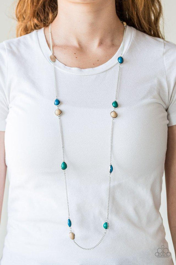 Paparazzi Pacific Piers- Multi Featuring round and teardrop shapes, blue, brown, and green beads trickle along an elongated silver chain for a seasonal look. Features an adjustable clasp closure.

