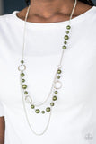 Paparazzi Party Dress Princess- Green Pearly green beads and shimmery silver hoops trickle along glistening silver chains, creating mismatched layers down the chest. Features an adjustable clasp closure.

