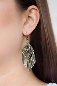 Paparazzi Western Rattler - Brass Radiating with a stunning sunburst pattern, a brass kite-shaped frame gives way to an antiqued brass feather fringe for a seasonal look. Earring attaches to a standard fishhook fitting.

