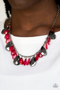 Paparazzi Hurricane Season - Red Gunmetal - Necklace - Tinted in the robust shade of Wine, glassy and polished red teardrops drip from the bottom of a shimmery gunmetal chain. Faceted gunmetal teardrops trickle between the colorful beading, adding a flashy finish to the flirtatious fringe. Features an adjustable clasp closure. 