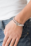 Paparazzi A PEACE Of Work - Pink Infused with a braided white leather band, gray cording knots around pieces of pink rocks and glistening silver accents for a seasonal look. Features an adjustable sliding knot closure.

