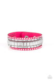 Paparazzi Rock Star Rocker - Pink - Bracelet  -  Shiny silver studs, dainty silver ball chains, and edgy white emerald-cut rhinestones race along a spliced pink suede band for a rock star look. Features an adjustable snap closure.
