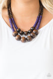 Paparazzi Cancun Cast Away - Purple Earthy brown and vivacious purple wooden beads and discs are threaded along shiny strands of brown cording, creating colorful layers. Features a button loop closure.

