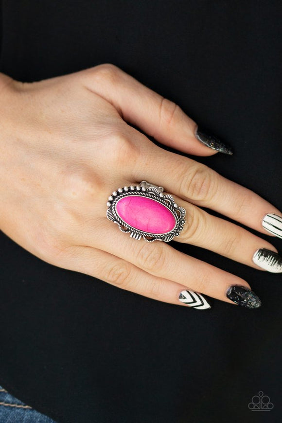 Paparazzi Open Range - Pink - Ring  -  A vivacious pink stone is pressed into an ornate silver frame rippling with studded and serrated textures for a seasonal flair. Features a stretchy band for a flexible fit.
