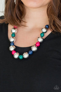 Paparazzi Top Pop - Multi - Necklace  -  Polished multicolored beads and dramatic silver beads drape below the collar for a perfect pop of color. Features an adjustable clasp closure.
