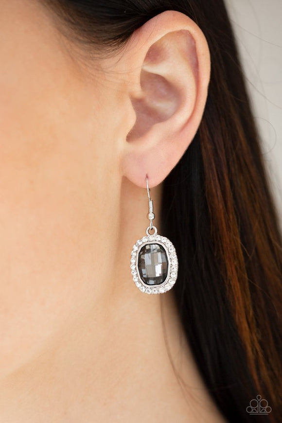 Paparazzi The Modern Monroe - Silver - Earrings  -  A smoky gem is pressed into a shimmery silver frame radiating with glassy white rhinestones for a timeless fashion. Earring attaches to a standard fishhook fitting.
