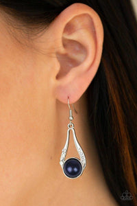 Paparazzi HEADLINER Over Heels - Blue A pearly blue bead is nestled along the bottom of an elegant silver frame radiating with glassy white rhinestones for a timeless look. Earring attaches to a standard fishhook fitting.

