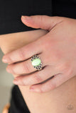 Paparazzi Princess Problems - Green A minty green bead is pressed into the center of a shimmery silver band swirling with frilly filigree for a whimsical look. Features a dainty stretchy band for a flexible fit.

