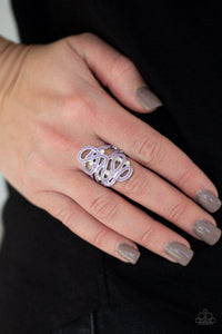 Paparazzi The Run-Around- Purple
Painted in a shiny purple finish, glistening silver ribbons whirl around dainty white rhinestones, coalescing into a whimsical frame atop the finger. Features a stretchy band for a flexible fit.
