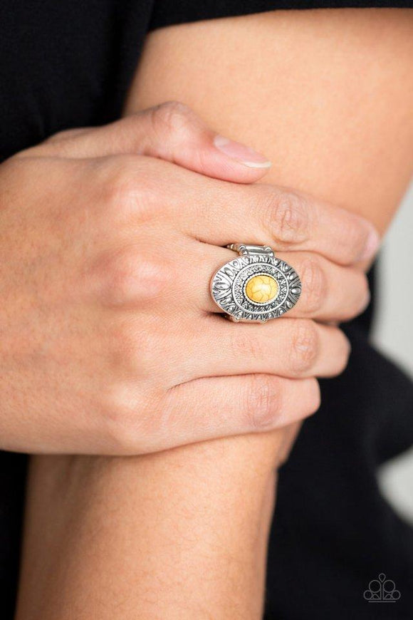 Paparazzi Stone Fox - Yellow A sunny yellow stone is pressed into the center of a silver frame radiating with tribal inspired textures for a seasonal look. Features a stretchy band for a flexible fit.

