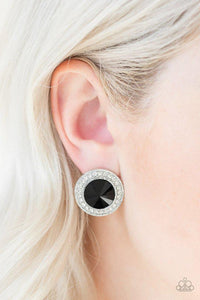 Paparazzi What Should I BLING? - Black A faceted black gem is pressed into the center of a shimmery silver frame encrusted in a ring of glassy white rhinestones for a timeless fashion. Earring attaches to a standard post fitting.
