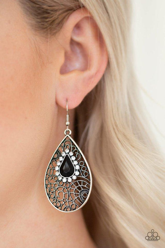Paparazzi Modern Monte Carlo - Black Ringed in glassy white rhinestones, a teardrop black bead is pressed into a shimmery silver frame radiating with airy filigree for a refined fashion. Earring attaches to a standard fishhook fitting.


