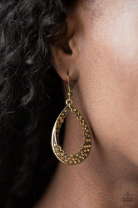 Paparazzi Royal Treatment - Brass Dotted with dainty brass studs, the inside and outside of a brass teardrop is encrusted in golden topaz rhinestones for a regal look. Earring attaches to standard fishhook fitting.

Get The Complete Look!
Necklace: "Red Carpet Royal - Brass" (Sold Separately)