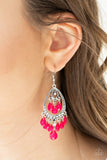 Paparazzi Gorgeously Genie - Pink - Earrings  -  Faceted Pink Peacock teardrops swing from the top and bottom of a studded silver frame radiating with glassy white rhinestones for a flirtatious shine. Earring attaches to a standard fishhook fitting.
