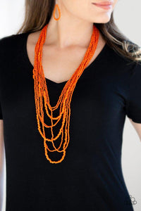 Paparazzi Totally Tonga - Orange  -  Varying in size, row after row of vivacious orange seed beads cascade down the chest, creating summery layers. Features an adjustable clasp closure.
