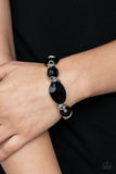 Paparazzi Savor The Flavor - Black Brushed in a faux-rock finish, a collection of faceted black beads and shimmery silver links are threaded along a stretchy band around the wrist for a flavorful look.
