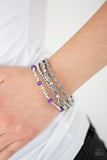 Paparazzi Full Of WANDER - Purple A collection of mismatched silver beads, silver cubes, and faceted purple beads are threaded along four stretchy bands around the wrist for a colorful flair.

