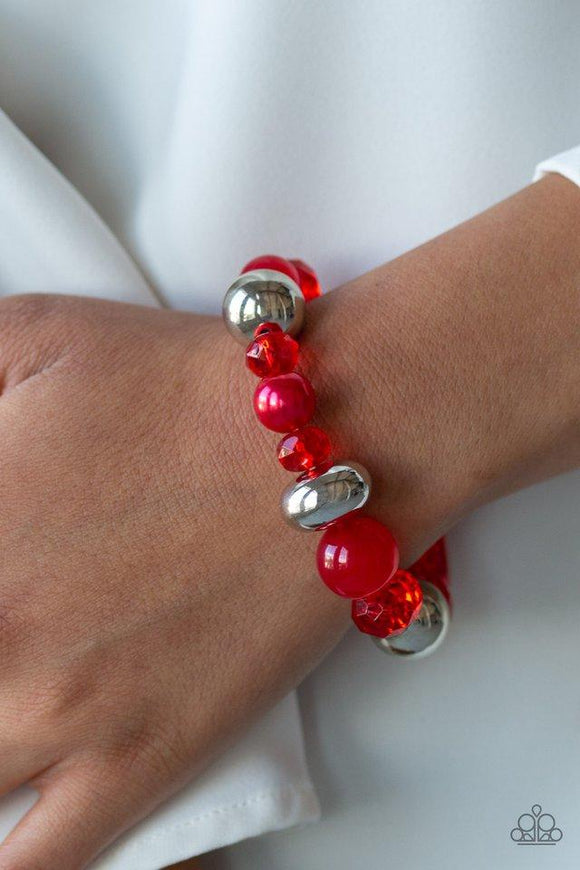 Paparazzi Ice Ice-Breaker - Red Infused with mismatched silver beads, a collection of opaque, polished, pearly, and crystal-like red beads are threaded along a stretchy band around the wrist for a whimsical look.
