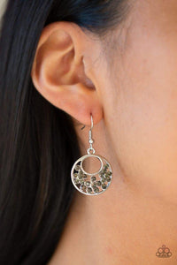 Paparazzi Sugary Shine - Silver Smoky rhinestones are sprinkled across the center of an airy silver hoop for a whimsical look. Earring attaches to a standard fishhook fitting.

