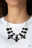 Paparazzi Goddess Glow - Black - Necklace  -  A collision of round, oval, and teardrop black rhinestone encrusted frames delicately connect below the collar for a glamorous look. Features an adjustable clasp closure.
