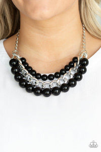 Paparazzi Empire State Empress - Black Two strands of dramatic black beads flank one strand of oversized silver chain, creating statement-making layers below the collar. Features an adjustable clasp closure.
