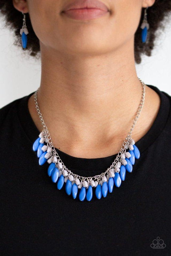 Paparazzi Bead Binge - Blue  -  Varying in size and shape, imperfect blue and gray beads cascade from the bottom of a shimmery silver chain, creating a vivacious fringe below the collar. Features an adjustable clasp closure.

