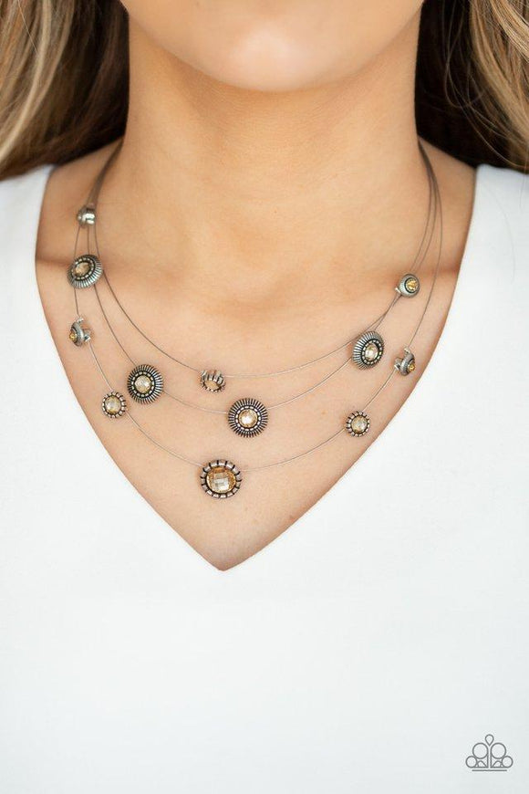 Paparazzi SHEER Thing! - Brown  -  Dotted with topaz rhinestone centers, an array of ornate silver frames trickle along skinny silver wires below the collar for a whimsical flair. Features an adjustable clasp closure.
