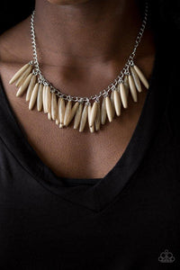 Paparazzi Full Of Flavor - Brown Polished and cloudy Soybean beads cascade from the bottom of a shimmery silver chain, creating a colorful fringe below the collar. Features an adjustable clasp closure.

