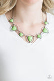 Paparazzi Make A Point - Green Varying in size, pyramidal green beads are encased in airy silver frames and linked below the collar for a trendsetting look. Features an adjustable clasp closure.

