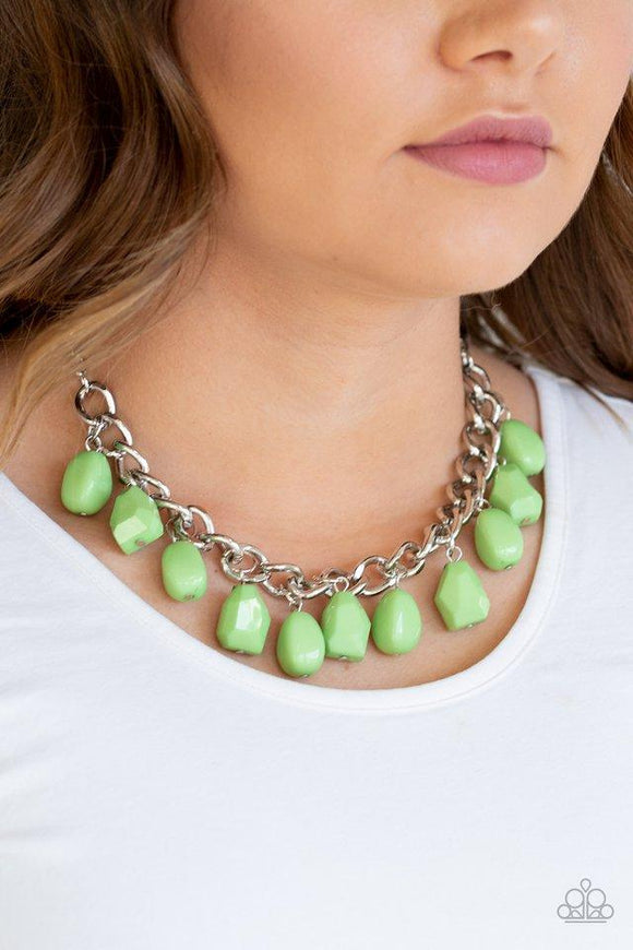 Paparazzi Take The COLOR Wheel - Green A collection of round and faceted green beads swings from the bottom of a bulky silver chain below the collar, creating a vivacious fringe. Features an adjustable clasp closure.

