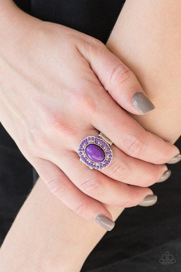 Paparazzi Colorfully Rustic - Purple  -  Dainty purple, white, and brown beads encircle a larger purple bead, creating a colorful frame atop the finger. Features a stretchy band for a flexible fit.
