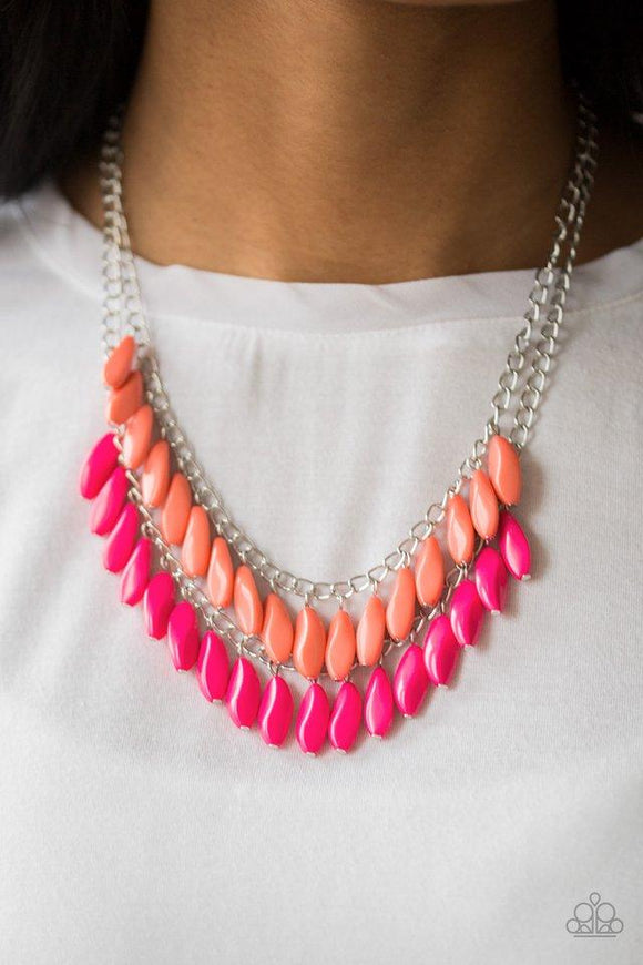 Paparazzi Beaded Boardwalk - Pink  -  A row of faceted Living Coral beads swings above a row of faceted pink beads, creating a vivacious double fringe below the collar. Features an adjustable clasp closure.
