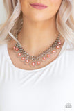 Paparazzi Party Time - Orange  -  A collection of airy silver hoops and bubbly coral pearls swing from the bottom of interlocking silver chains, creating a flirtatious fringe below the collar. Features an adjustable clasp closure.
