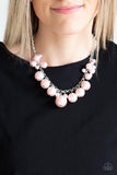 Paparazzi Broadway Belle - Pink  -  Capped in shiny silver fittings, oversized pearly pink beads and a collection of classic pink pearls swing from the bottom of a shimmery silver chain, creating a bubbly fringe below the collar. Features an adjustable clasp closure.
