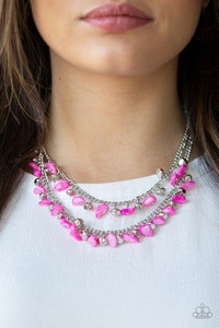 Paparazzi Pebble Pioneer - Pink - Necklace
Two strands of vivacious pink pebbles and faceted silver beads swing from the bottoms of two layered chains, creating a colorful fringe below the collar. Features an adjustable clasp closure.
