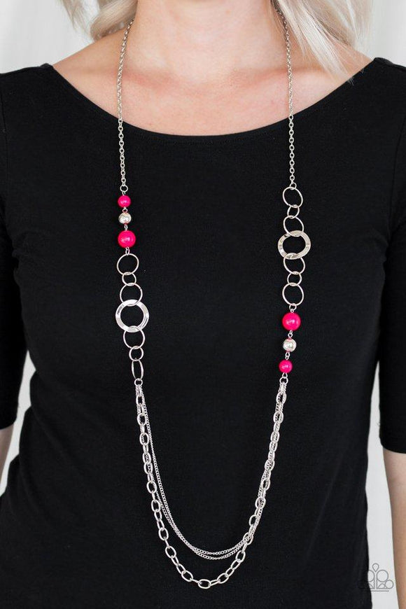 Paparazzi Modern Motley- Pink Vivacious pink beads, shiny silver beads, and glistening silver hoops give way to mismatched silver chains for a whimsical look. Features an adjustable clasp closure.

