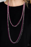 Paparazzi What A COLORFUL World - Pink  -  Mismatched silver chains and silver satellite chains layer down the chest. Brushed in a vivacious pink finish, layers of ball-chain are added to the whimsical compilation for a colorful finish. Features an adjustable clasp closure.
