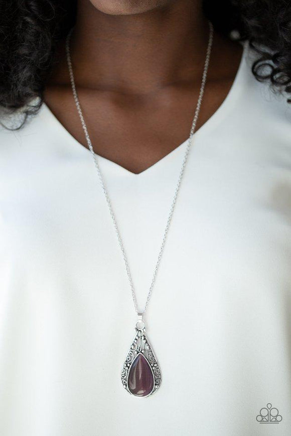 Paparazzi Enchanted Eden - Purple  -  A teardrop purple cat's eye stone is pressed into a frilly silver frame radiating with vine-like filigree. The whimsical pendant swings from the bottom of a lengthened silver chain for a seasonal finish. Features an adjustable clasp closure.
