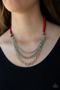 Paparazzi Free Roamer - Red  -  Suspended between strips of fiery red suede, mismatched strands of silver layer below the collar for a spunky industrial look. Features an adjustable clasp closure.
