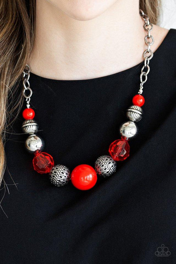 Paparazzi Sugar Sugar - Red A collection of antiqued silver beads, glassy red crystal-like beads, and oversized red beads are threaded along an invisible wire below the collar. Textured in linear patterns, an antiqued silver chain attaches to the colorful compilation for a statement-making finish. Features an adjustable clasp closure.

