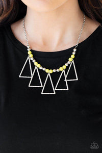 Paparazzi Terra Nouveau - Yellow  -  A collection of shiny silver and vibrant yellow beads are threaded along an invisible wire below the collar. Hammered triangular frames swing from the bottom of the colorful compilation, creating an artistic fringe. Features an adjustable clasp closure.
