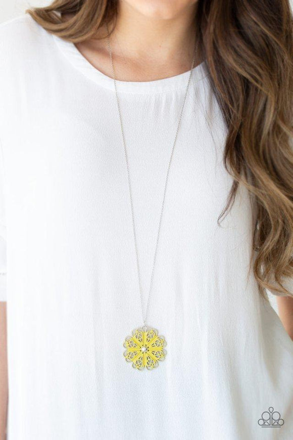 Paparazzi Spin Your PINWHEELS - Yellow Brushed in a sunny yellow hue, filigree filled petals spin around a silver beaded center for a colorful look. The frilly floral pendant swings from the bottom of a lengthened silver chain for a whimsical finish. Features an adjustable clasp closure.

