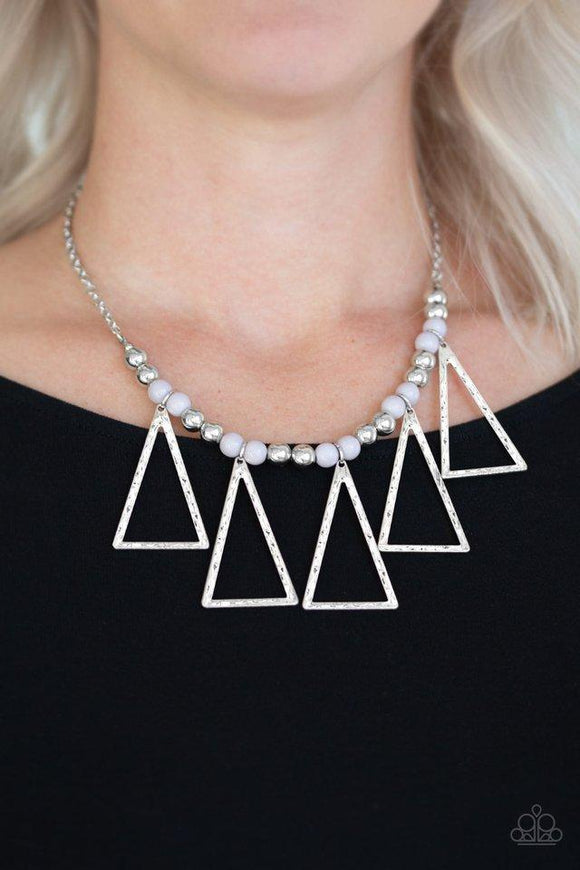 Paparazzi Terra Nouveau - Silver  -  A collection of shiny silver and polished gray beads are threaded along an invisible wire below the collar. Hammered triangular frames swing from the bottom of the colorful compilation, creating an artistic fringe. Features an adjustable clasp closure.

