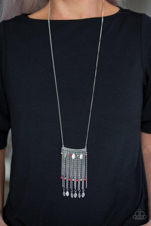 Paparazzi On The Fly - Multi  -  Attached to a lengthened silver chain, a hammered silver bar gives way to a fringe of shimmery silver chain, brown and red stone beads, and silver feather frames for a seasonal look. Features an adjustable clasp closure.

