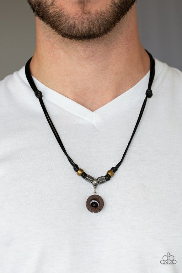 Paparazzi Tiki Thunder - Black - Necklace  -  A collection of brass and silver accents are knotted in place below the collar. A black wooden bead is threaded along a rod in the center of a brown lava rock pendant for a seasonal flair. Features an adjustable sliding knot closure.
