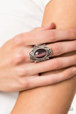 Paparazzi Fairytale Flair - Purple - 2019 Convention Exclusive
A glowing purple cat's eye stone is nestled inside of an airy silver frame radiating with frilly filigree for a whimsical look atop the finger. Features a stretchy band for a flexible fit.
