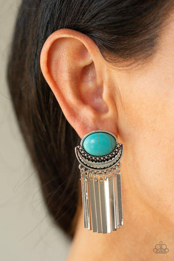 Paparazzi Monsoon Season - Blue A refreshing turquoise stone is pressed into the top of a silver studded half-moon frame. Flat silver rods swing from the bottom of the earthy frame, for a noise-making finish. Earring attaches to a standard post fitting.
